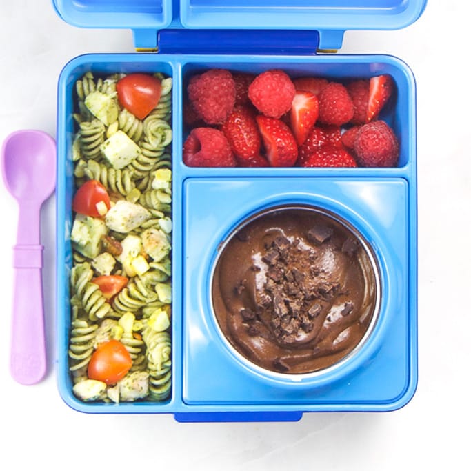 Blue school lunch box filled with easy and colorful school lunch ideas for kids.