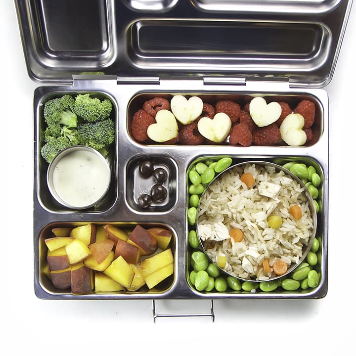 A kid friendly school lunch inside a bento box. 