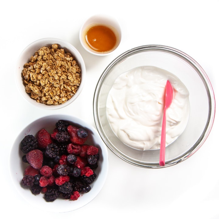 Spread of ingredients for the berry yogurt bark for toddler and kids. 