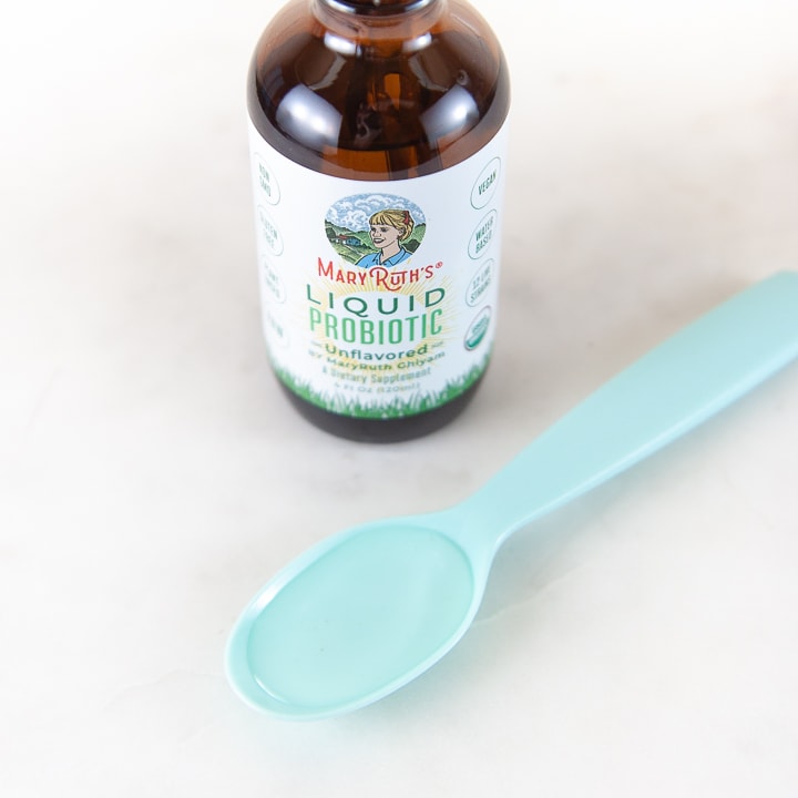 Liquid probiotics in a spoon.