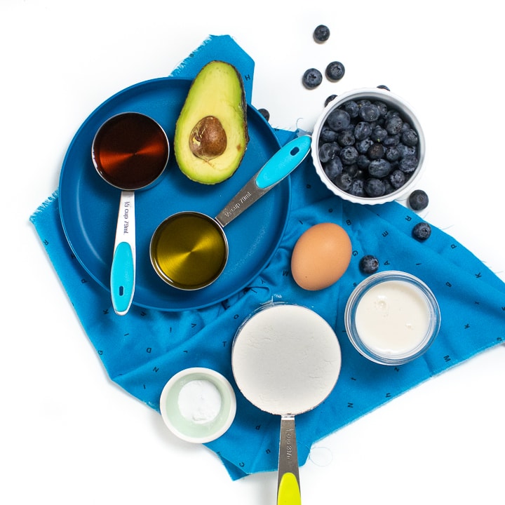 Spread of ingredients for blueberry avocado muffins.