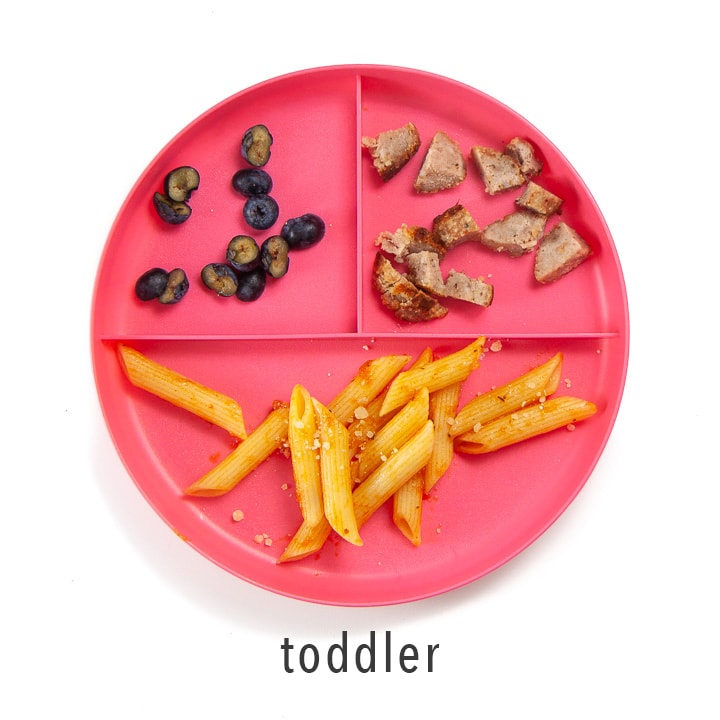 A plate with these meatballs and sides for toddler.