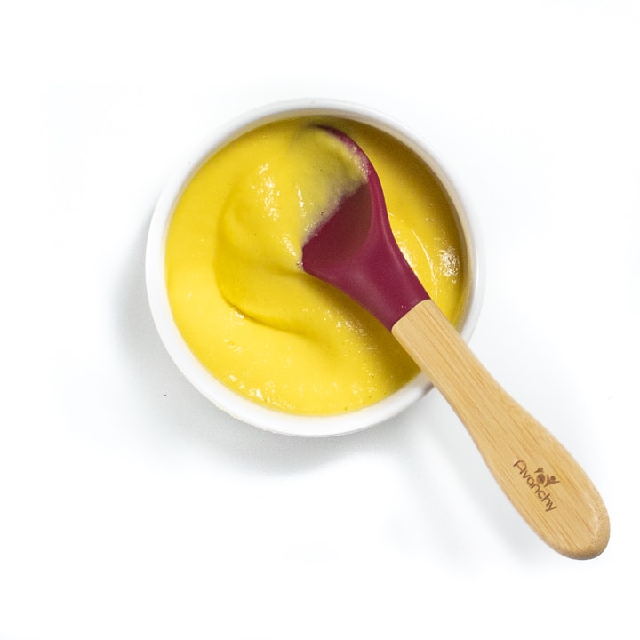 small bowl of purees mango and eggs in a smooth puree.