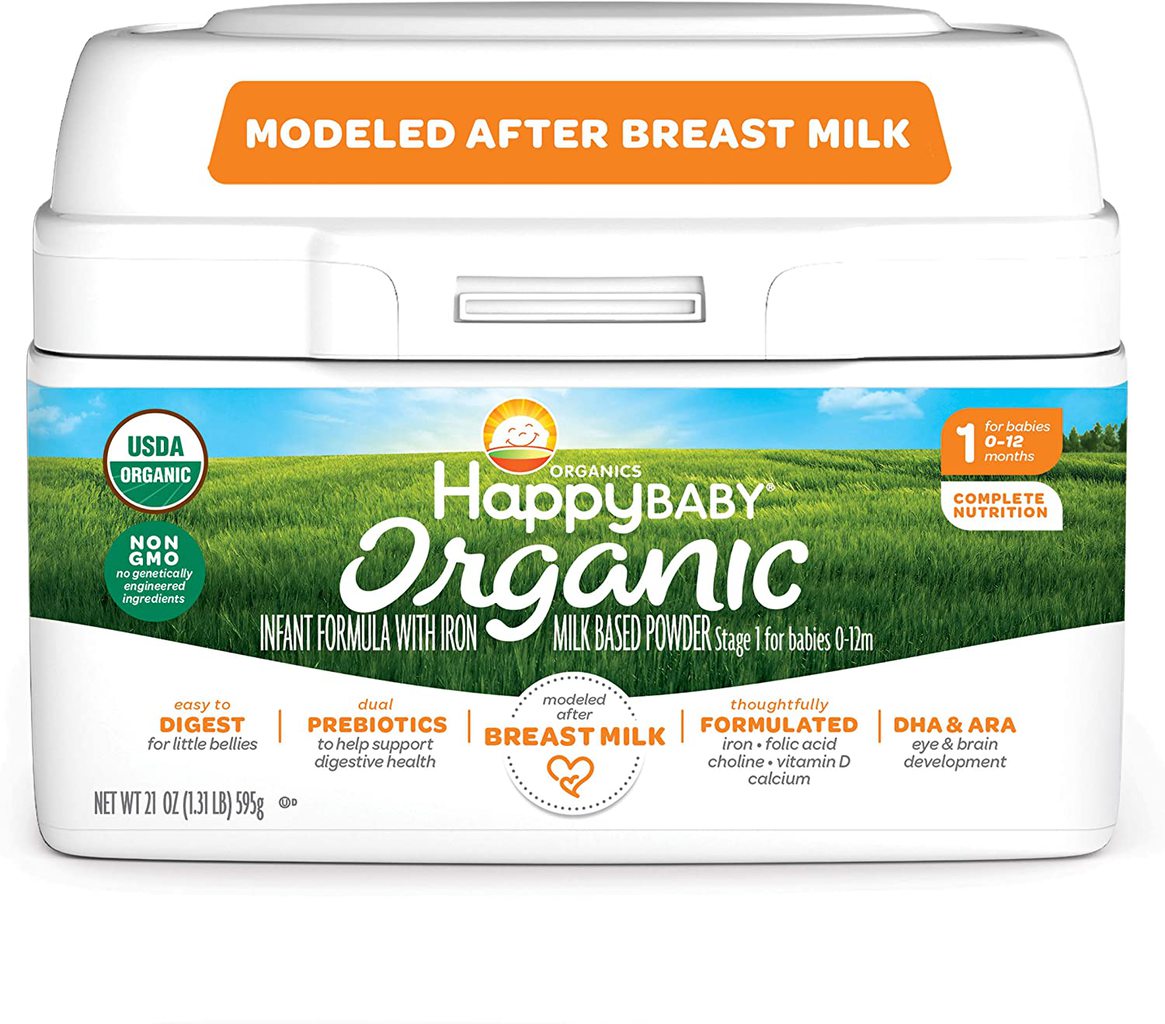 Happy baby organic formula in a white plastic tub.