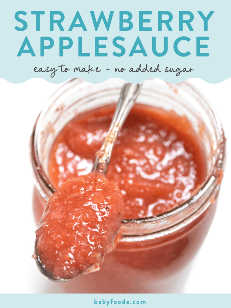 Graphic for post - strawberry applesauce, easy to make, no added sugar. Image is of a clear jar with a silver spoon on top filled with a pink applesauce with strawberries. 