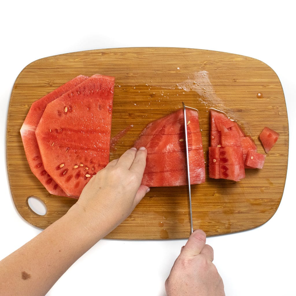 a slice of watermelon cut into cubes.