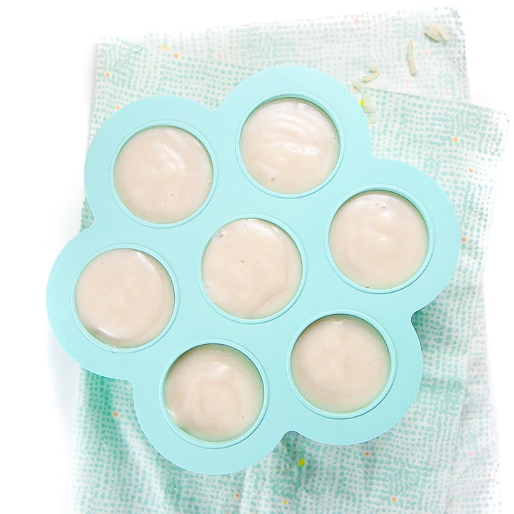 Baby food Storage tray with homemade rice baby cereal inside.