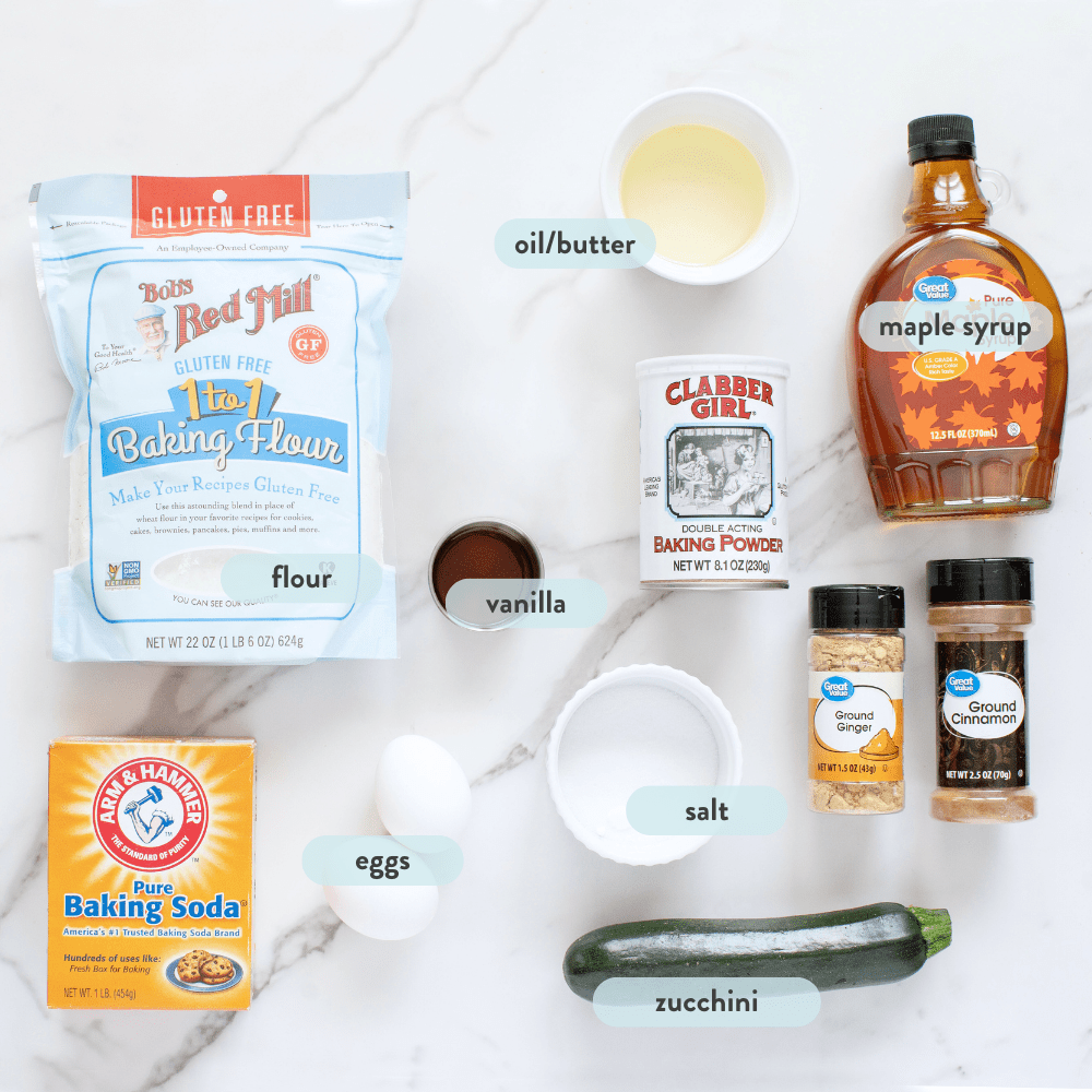 Spread of ingredients on a white marble kitchen counter with labels on them.