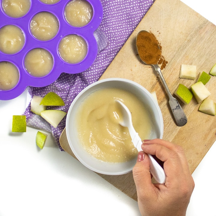 Spread of easy pear puree for baby.