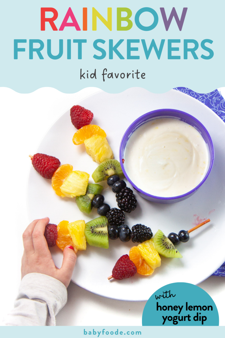 Graphic for post – rainbow fruit skewers/kid friendly, with honey lemon yogurt dip. Images of a hand reaching for a fruit skewer on a white plate against a white background with a kid friendly purple napkin.