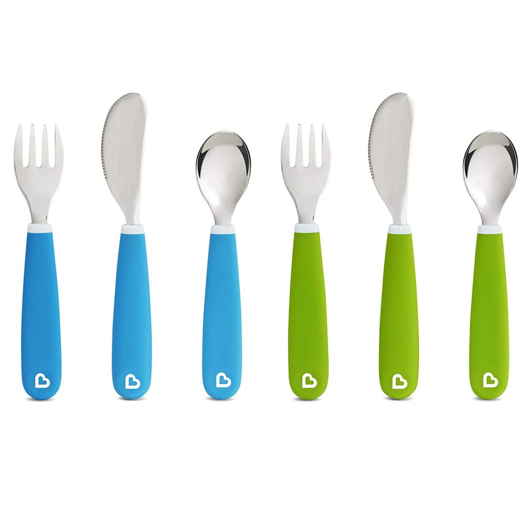 toddler utensils with teal and green handles. 