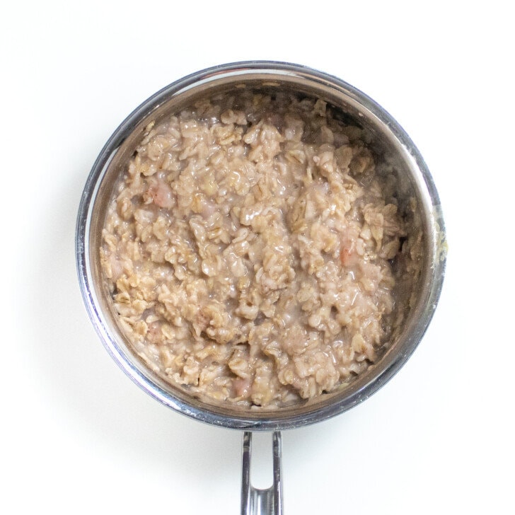 Cook strawberry oatmeal, and a white countertop.