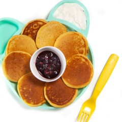 Baby plate full of sweet potato pancakes.