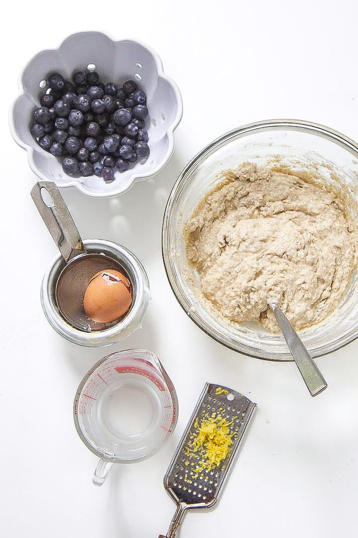 ingredients being used to make toddler blueberry muffins.