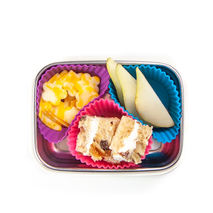 Travel snack container for toddler or kids filled with healthy foods.