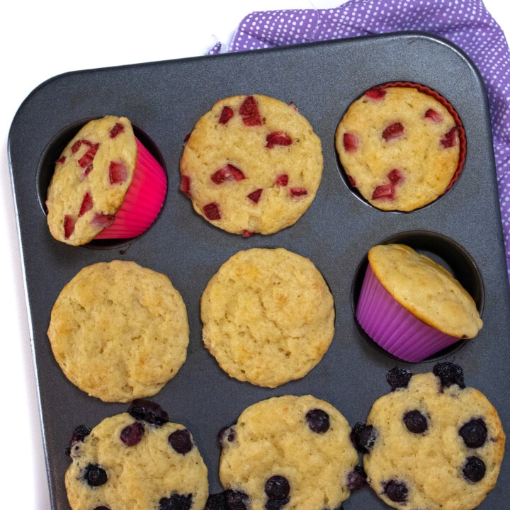 A muffin tin full of cooked yogurt muffins.